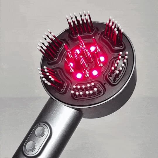 The RoseLume Care comb head lit red, with bristles around a central ring of red lights and metal contact pins